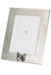 Fotoram urna med silverfärgat fjäril