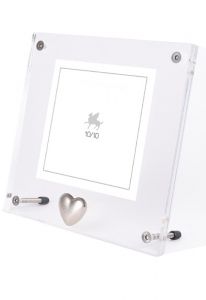 Fotoram av plexiglas med silverfärgat hjärta miniurna