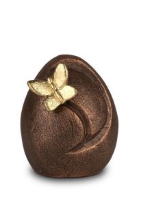 Skulptural miniurna i keramik ”Öm frihet” med bronsfinish