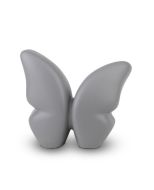 Liten handgjord fjärilsurna i keramik, grå